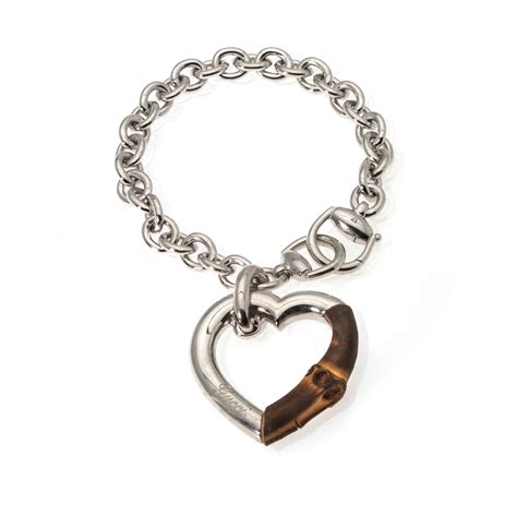 gucci sterling silver and bamboo heart bracelet|silver bracelet with interlocking g.